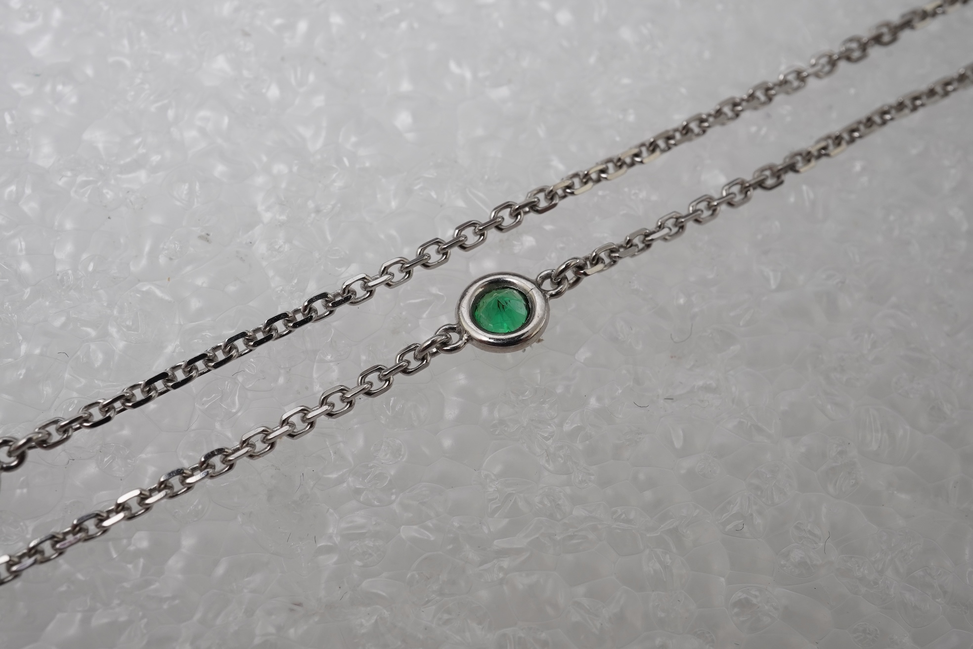 A diamond and tsavorite pendant necklace